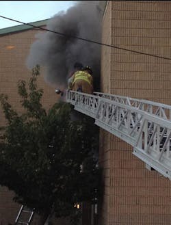 D.C. firefighters from Truck 4 are seen rescuing civilians from a fast moving apartment fire on Oct. 4. D.C. firefighters from Truck 4 are seen rescuing civilians from a fast moving apartment fire on Oct. 4.