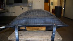 Photo 2. When the airbag is inflated it takes on a pillow shape, which reduces the surface area in contact with the object. Photo 2. When the airbag is inflated it takes on a pillow shape, which reduces the surface area in contact with the object.