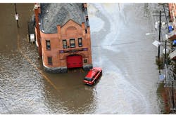 A firehouse is surrounded by floodwaters in the wake of superstorm Sandy in Hoboken, N.J. on Oct. 30.