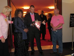 Assistant Chief Denise Pouget left, Fire Chief Adam Thiel, second from right and Capt. Rodney Masser, far right, share a moment with Roberta Flack. Assistant Chief Denise Pouget left, Fire Chief Adam Thiel, second from right and Capt. Rodney Masser, far right, share a moment with Roberta Flack.