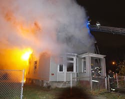 Detroit firefighters are seen battling a house fire during a relatively calm Angels&apos; Night period due to Superstorm Sandy and volunteer efforts.