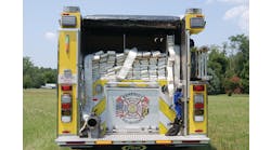 The rear hose bed carries split beds of 3-inch hose, together with a preconnected 2.5-inch attack line and a leader line equipped with a TFT Blitz Fire portable master stream.