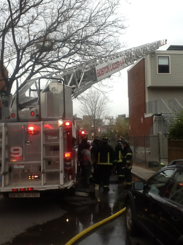 A two-alarm apartment fire in the Boston neighborhood of Charlestown injured a resident and one firefighter on Nov. 7.