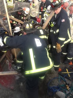 Boston crews freed a trapped construction worker on Nov. 5. Boston crews freed a trapped construction worker on Nov. 5.
