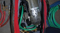 Photo 1 - You don't want to be left unable to complete the operation because equipment was left on the apparatus. This bag contains an air bottle, fittings, control panel, hoses and more. Photo 1 - You don't want to be left unable to complete the operation because equipment was left on the apparatus. This bag contains an air bottle, fittings, control panel, hoses and more.