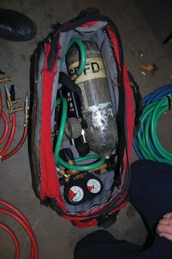 Photo 1 - You don't want to be left unable to complete the operation because equipment was left on the apparatus. This bag contains an air bottle, fittings, control panel, hoses and more. Photo 1 - You don't want to be left unable to complete the operation because equipment was left on the apparatus. This bag contains an air bottle, fittings, control panel, hoses and more.
