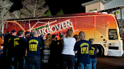 Heart of the Pines firefighters gather for the unveiling of the home built for the Zdroj family with the help of Extreme Makeover:Home Edition and local builder EFC Custom Homes.