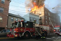 DEC. 3: UNION CITY, NJ &ndash; Firefighters found heavy fire coming from the top floor of an occupied four-story mixed-use building. Approximately 20 people escaped the fire, but nearly 100 residents were displaced. As crews advanced on the fire, the roof collapsed. Ladder pipes, a squirt and a tower ladder from Jersey City responded to the third alarm.