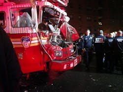 Six firefighters were injured when the aerial they were in collided with a garbage truck. None of the injuries are thought to be life-threatening.