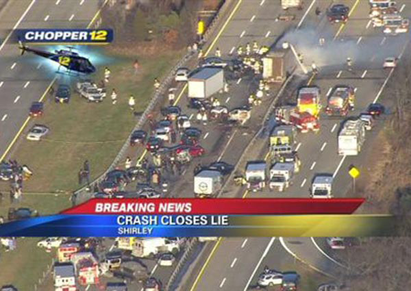 This image taken from video on the News 12 Long Island website shows an aerial view of a multi-vehicle accident on the Long Island Expressway, Wednesday, Dec. 19, 2012, in Shirley, N.Y. Police have closed the Expressway between exits 65 and 69 so first responders can work the scene. Over 20 vehicles are believed to be involved.