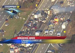 This image taken from video on the News 12 Long Island website shows an aerial view of a multi-vehicle accident on the Long Island Expressway, Wednesday, Dec. 19, 2012, in Shirley, N.Y. Police have closed the Expressway between exits 65 and 69 so first responders can work the scene. Over 20 vehicles are believed to be involved.
