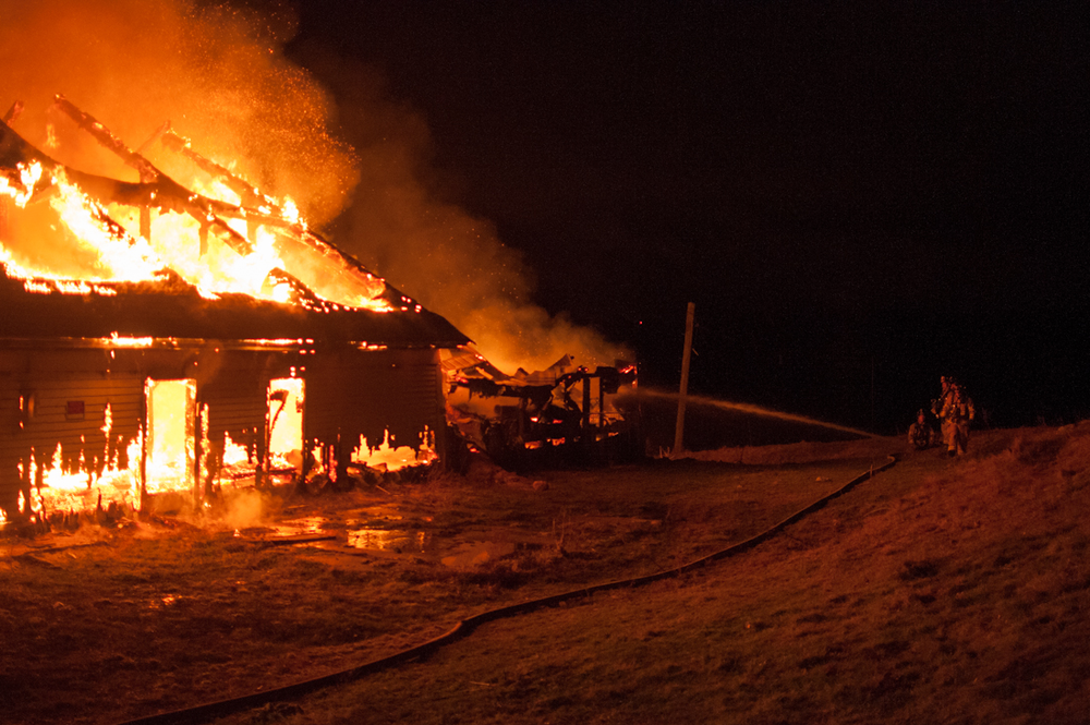 Manchester firefighters are suspicious about what caused the blaze at the empty barn that had no gas or electricity hooked to, epecially since they had been on the property for other fires in the past.