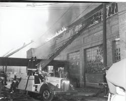 BALTIMORE, MD, MAY 10, 1962 &ndash; A 12-alarm fire raced through huge piles of rags at the S. Shapiro &amp; Sons rag-processing and storage plant. Due to the intensity of the fire, a defensive attack was ordered on arrival. Firefighters were on the scene for 41 days to control hot spots.