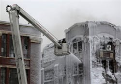 Firefighters continue battling a massive warehouse fire Wednesday, Jan. 23, 2013 in Chicago, that officials say is one of the largest fires in recent years. More than 170 firefighters have responded to the five-alarm blaze that started at about 9 p.m. Tuesday Jan, 22, 2013. Firefighters continue battling a massive warehouse fire Wednesday, Jan. 23, 2013 in Chicago, that officials say is one of the largest fires in recent years. More than 170 firefighters have responded to the five-alarm blaze that started at about 9 p.m. Tuesday Jan, 22, 2013.