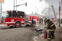Chicago Engine 26 connected to a hydrant with its 6-inch hard suction, which reduces friction loss and provides an unobstructed waterway for maximum flow.