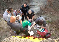 Fort Worth (Texas) firefighters rescued a man who called 911 after falling off an eight-foot cliff while walking his dog on Sunday.