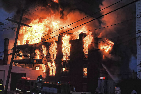 Fire tears through a Fitchburg building.