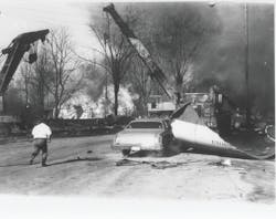 Parts of tank car 83013, burning propane and other debris were scattered over a wide area. One piece of the tank car was propelled 330 feet by the explosion. Noise and blast pressure from the explosion were felt several blocks from the scene. Parts of tank car 83013, burning propane and other debris were scattered over a wide area. One piece of the tank car was propelled 330 feet by the explosion. Noise and blast pressure from the explosion were felt several blocks from the scene.