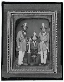 Foremen from the Phoenix Fire Company and Mechanic Fire Company in Charleston, SC, pose for a Daguerreotype, circa 1855.