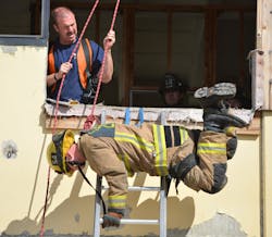 A firefighter participates in the IAFF Fireground Survival hands-on program to learn self-rescue techniques. A firefighter participates in the IAFF Fireground Survival hands-on program to learn self-rescue techniques.