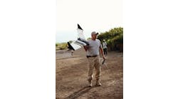 Gene Robinson of RP Flight Systems demonstrates a Spectra unmanned aerial vehicle (UAV) in Africa. The Spectra line is designed to be deployed to scenes of natural disasters, primarily for search and recovery.