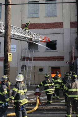 More than 55 fire units from five counties responded to a stubborn fire in a large warehouse. The fire burned for a record 57 days before being totally extinguished. More than 55 fire units from five counties responded to a stubborn fire in a large warehouse. The fire burned for a record 57 days before being totally extinguished.