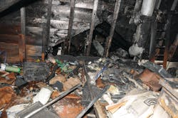 Firefighter Stephen Makos: 'We advanced a dry line up the stairs to the second floor, where we found access to the attic stairwell. When we opened the door, we encountered thick smoke with no visibility. Captain Boutin called for water and we continued to advance to the top of the stairs. At the top, we were met with high heat and no visibility.' Firefighter Stephen Makos: 'We advanced a dry line up the stairs to the second floor, where we found access to the attic stairwell. When we opened the door, we encountered thick smoke with no visibility. Captain Boutin called for water and we continued to advance to the top of the stairs. At the top, we were met with high heat and no visibility.'