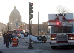 Emergency crews at the scene of a two car crash at University Avenue and Marion Street in St Paul at about 7 a.m. on Wednesday, April 3. Firefighters extricated one occupant from this pickup, and medics transported them to Regions Hospital.