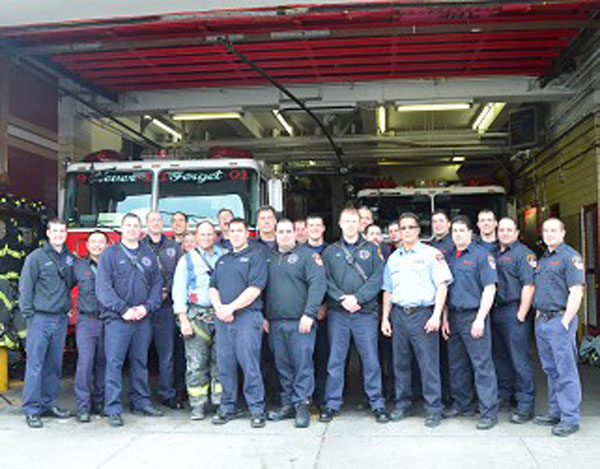 Teamwork helped several FDNY firefighter save eight people from a burning structure early Monday morning.