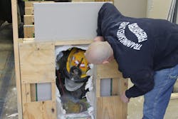 During the rapid intervention training program, Jim McCormack and his team showed the importance of teamwork within the group. During the rapid intervention training program, Jim McCormack and his team showed the importance of teamwork within the group.