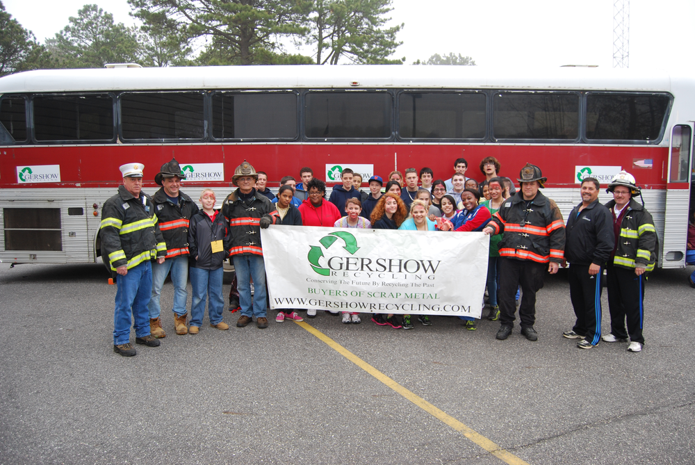 Charles Keeling (second from right), Safety Director, Gershow Recycling, poses with members of the Hagerman Fire Department and South Country Ambulance Corps after the mass casualty drill on April 19.