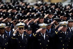 Scores of firefighters from as far away as Montreal salute their fallen brother. Scores of firefighters from as far away as Montreal salute their fallen brother.