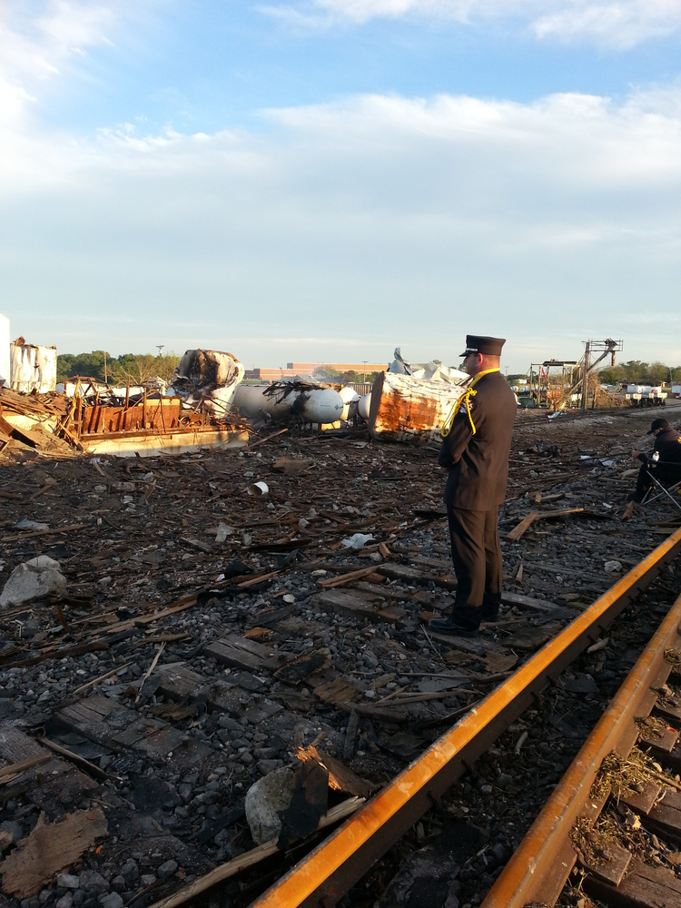 Bryan Firefighter/Paramedic Brad Moring stands guard at the plant explosion site