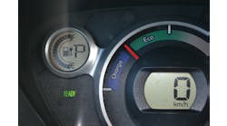 The instrument panel of this i-MiEV electric vehicle indicates that it is in the &apos;ready&apos; mode, is powered up, and can be operated and driven. Once the ignition is turned off, the ready light will go out, the red needle will drop, and the speedometer and battery-level displays will go out.