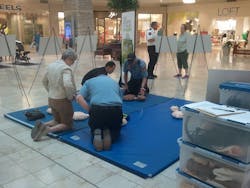 Eden Prairie, Minn., firefighters spent Saturday teaching hands-only CPR to patrons at a local mall. Eden Prairie, Minn., firefighters spent Saturday teaching hands-only CPR to patrons at a local mall.