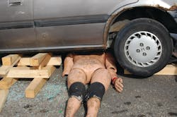 Photo 4 - The vehicle only only needs to be lifted high enough to free the trapped victim. Photo 4 - The vehicle only only needs to be lifted high enough to free the trapped victim.