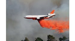 On third day of the &apos;Powerhouse Fire&apos; in Los Angeles County, CA, the fire had spread to 25,000 acres. A DC-10 was called in to drop a line of retardant on the west side of the fire to prevent the fast-moving blaze from entering Kings Canyon, a densely populated and steep canyon area nearby.