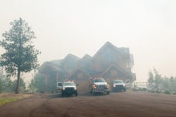 Fire crews work to protect a large structure as the Black Forest wildfire approaches this Colorado home recently. Fire crews work to protect a large structure as the Black Forest wildfire approaches this Colorado home recently.
