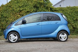 The 'floorpan-mounted' high-voltage battery of the Mitsubuishi i-MiEV weighs approximately 500 pounds. The entire vehicle weighs approximately 2,500 pounds so it is apparent that the vehicle is 'bottom heavy.' This is important to consider when stabilizing this vehicle. The floorpan battery is visible below the vehicle in this image. The 'floorpan-mounted' high-voltage battery of the Mitsubuishi i-MiEV weighs approximately 500 pounds. The entire vehicle weighs approximately 2,500 pounds so it is apparent that the vehicle is 'bottom heavy.' This is important to consider when stabilizing this vehicle. The floorpan battery is visible below the vehicle in this image.