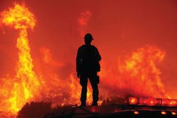 A U.S. Forest Service firefighter stands atop his engine to monitor conditions as his fellow firefighters operate during a firestorm in California. An early and busy wildland fire season is already putting emergency resources to the test. A U.S. Forest Service firefighter stands atop his engine to monitor conditions as his fellow firefighters operate during a firestorm in California. An early and busy wildland fire season is already putting emergency resources to the test.