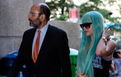 n a Tuesday, July 9, 2013 file photo, Amanda Bynes, accompanied by attorney Gerald Shargel, arrives for a court appearance in New York.