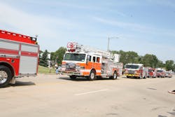 More than 60 fire apparatus participated in the parade down American Drive in front of the Pierce Mfg. plant. More than 60 fire apparatus participated in the parade down American Drive in front of the Pierce Mfg. plant.