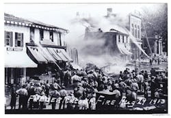 A fire broke out in a room over a clothing store in Fredericktown, OH, at 1 P.M. on Aug. 29, 1913, and spread quickly. Firefighters and apparatus responded from nearby Mount Vernon and helped battle the flames. The fire spread from the clothing store to a five-and-10-cent store, two meat markets, two barbershops, a grocery store, a restaurant and a drug store before it was brought under control. A fire broke out in a room over a clothing store in Fredericktown, OH, at 1 P.M. on Aug. 29, 1913, and spread quickly. Firefighters and apparatus responded from nearby Mount Vernon and helped battle the flames. The fire spread from the clothing store to a five-and-10-cent store, two meat markets, two barbershops, a grocery store, a restaurant and a drug store before it was brought under control.