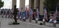 A memorial service was held in Prescott, AZ. Flags and the name of each of the 19 Hotshots were displayed outside. More than 30,000 were in attendance from around the world.