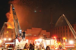 A three-alarm fire ripped through an old Seagram&apos;s factory building in Baltimore County, MD, on July 27, 2013.