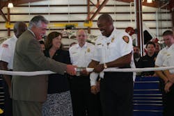 San Antonio District 6 City Councilman Ray Lopez (left), City Architect Carol Warkoczewski and SAFD Chief Charles Hood took part in the 'uncoupling' ceremony. San Antonio District 6 City Councilman Ray Lopez (left), City Architect Carol Warkoczewski and SAFD Chief Charles Hood took part in the 'uncoupling' ceremony.