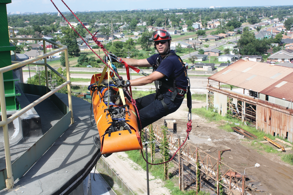 Going over the edge, 110 feet up. No 'made-for-TV' anchors, just the way we would do it in an actual incident.