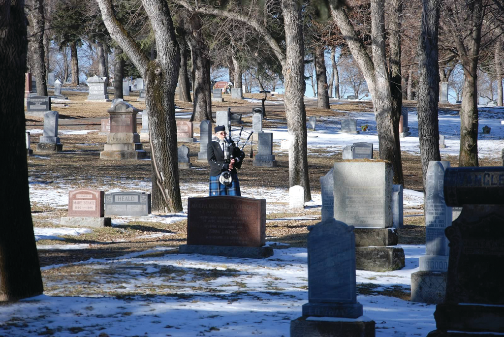 The fire service and family members gather in Medicine Hat, Alberta, to honor the memory of three fallen firefighters.