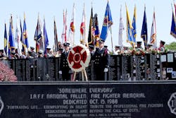 The fallen fire fighter memorial in Colorado Springs was decorated with flowers and flags. The fallen fire fighter memorial in Colorado Springs was decorated with flowers and flags.