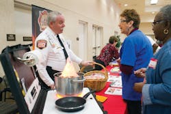 Las Vegas Fire & Rescue Public Education & Information Officer Timothy R. Szymanski talks with Marlene Moran during a Senior Safety Fair in October. Senior citizens were taught how to prevent fires and how to escape safely should a fire occur. Las Vegas Fire & Rescue Public Education & Information Officer Timothy R. Szymanski talks with Marlene Moran during a Senior Safety Fair in October. Senior citizens were taught how to prevent fires and how to escape safely should a fire occur.